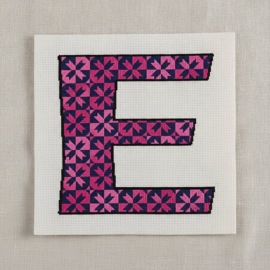 Pink Pinwheel Letter E — cross-stitch pattern